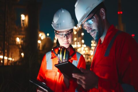 Workers conducting a planned outage services review at an industrial facility in Chicago, IL